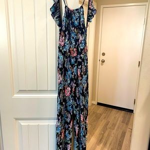 NWOT Free People Jumper Size Small. Black with Colorful Floral Design